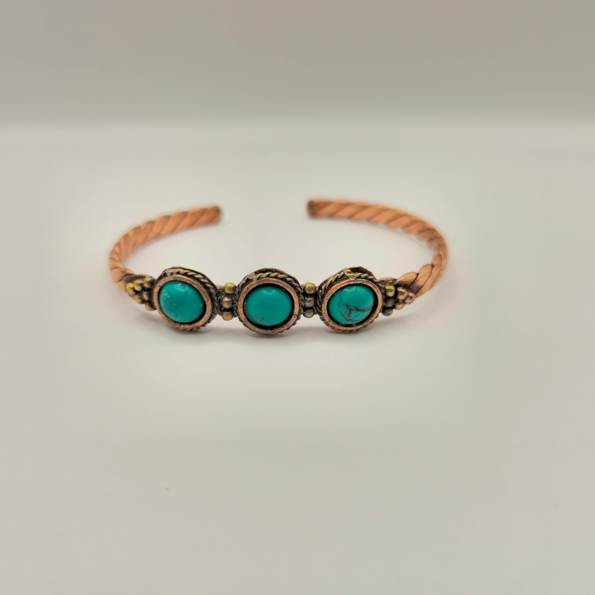 Bracelet torsadé pierres turquoises