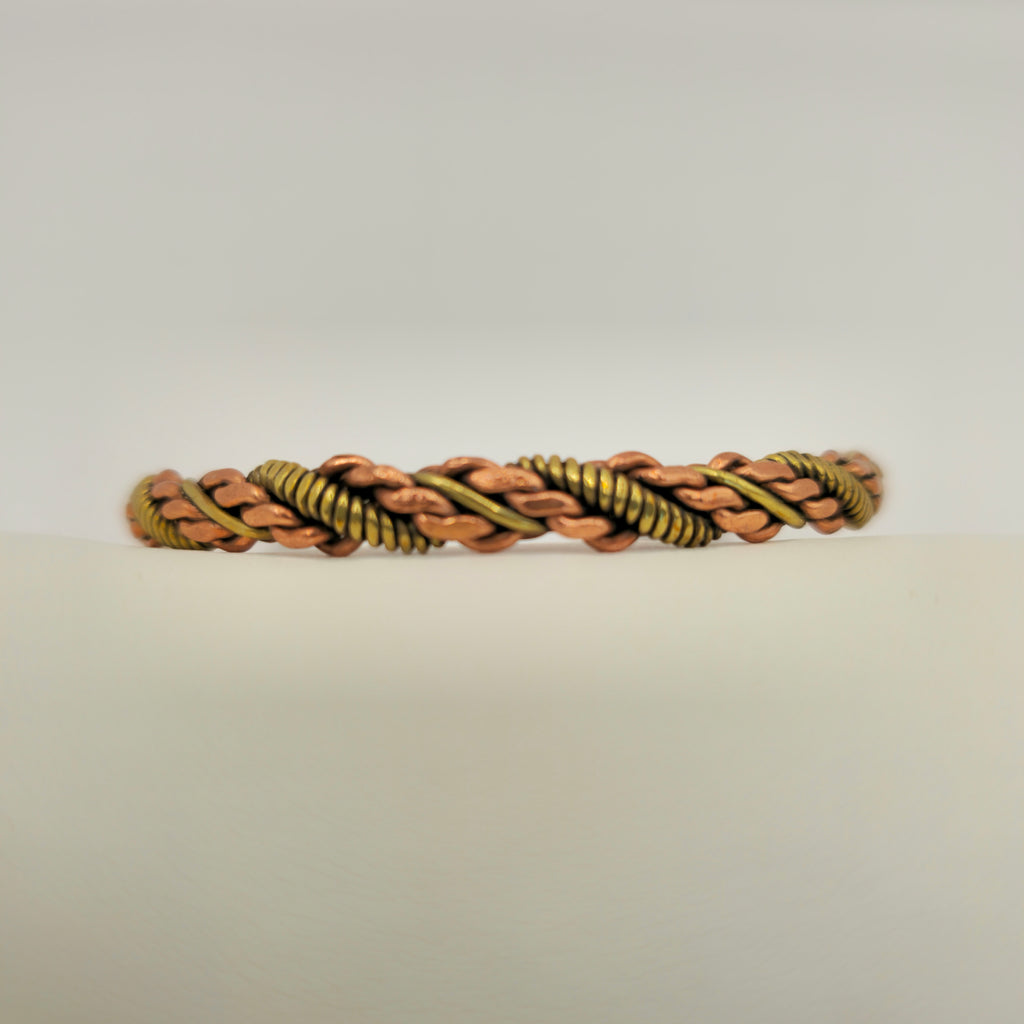 Bracelet torsadé couleur bronze/or - triple torsade
